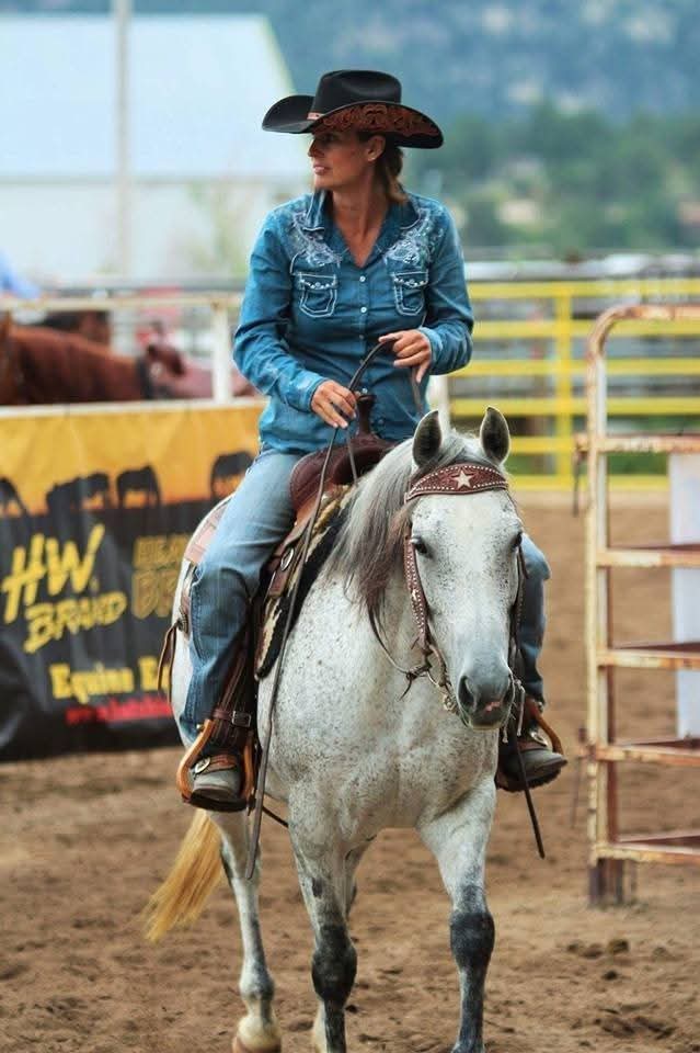 Stephanie of All Animal Recovery on her grey horse